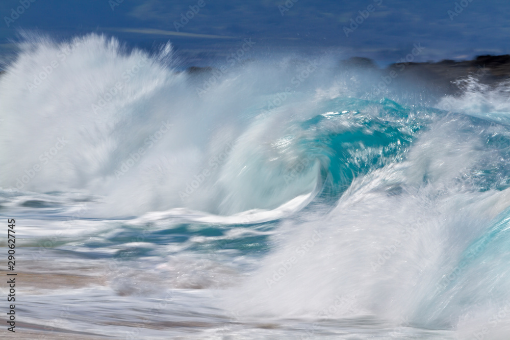 Motions blur breaking Ocean wave in Hawaii