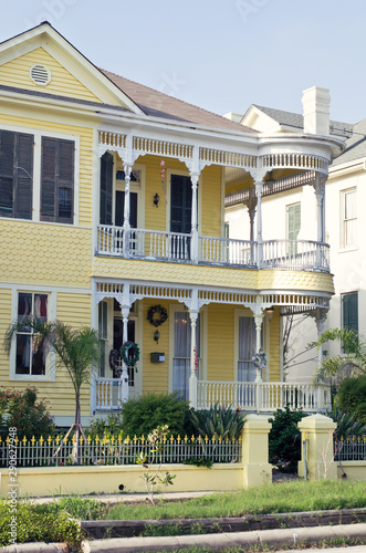 Vertical: Historic Queen Anne Style yellow house on Galveston Island, Texas