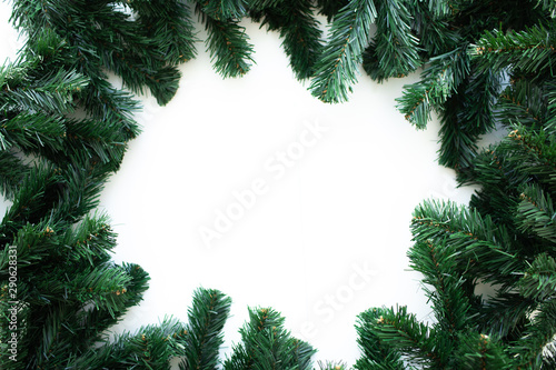 Christmas frame background with xmas tree and xmas decorations. Merry Christmas greeting card  banner. Winter holiday theme. Happy New Year. Space for text