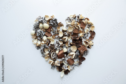 Flowers composition. Frame made of dried rose flowers on white background. Flat lay, top view, copy space photo