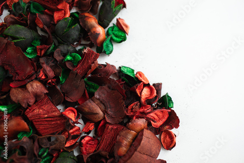 Flowers composition. Frame made of dried rose flowers on white background. Flat lay, top view, copy space photo