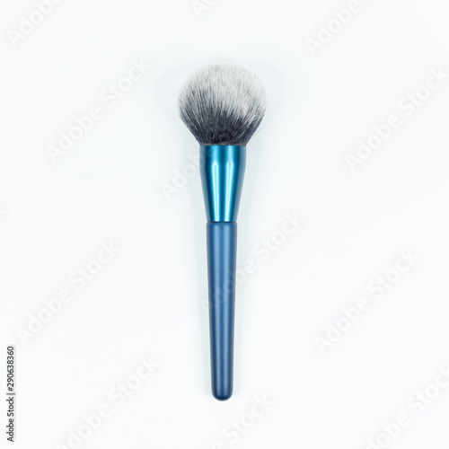 Blue brushes for makeup isolated on white background.