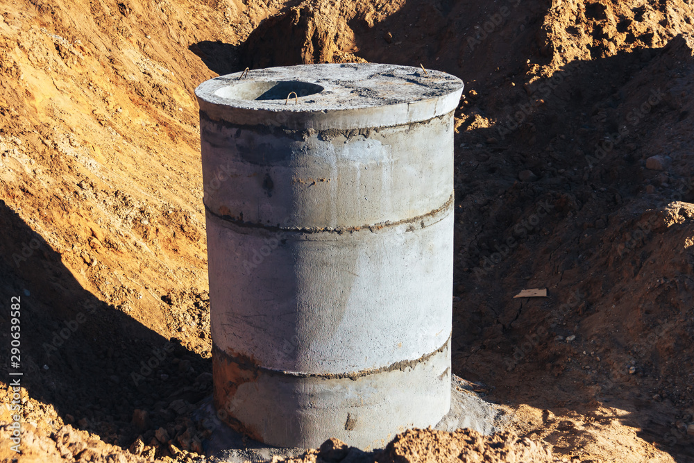 Construction site concrete well for water pipes Construction site concrete well for water pipes