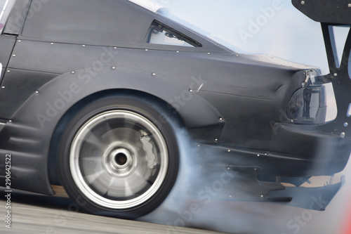 lose up drift car with smoke from burning tires