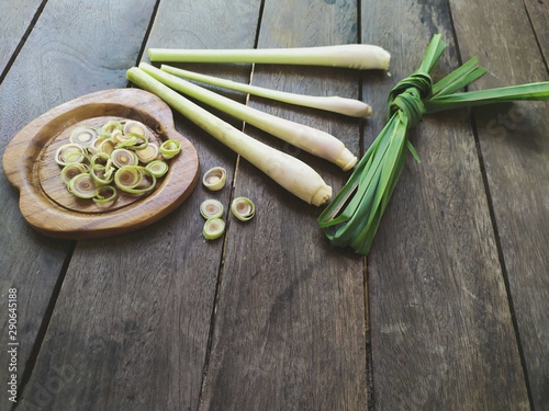 lemongrass or cymbopogon citratus on wood background design concept in rustic photo