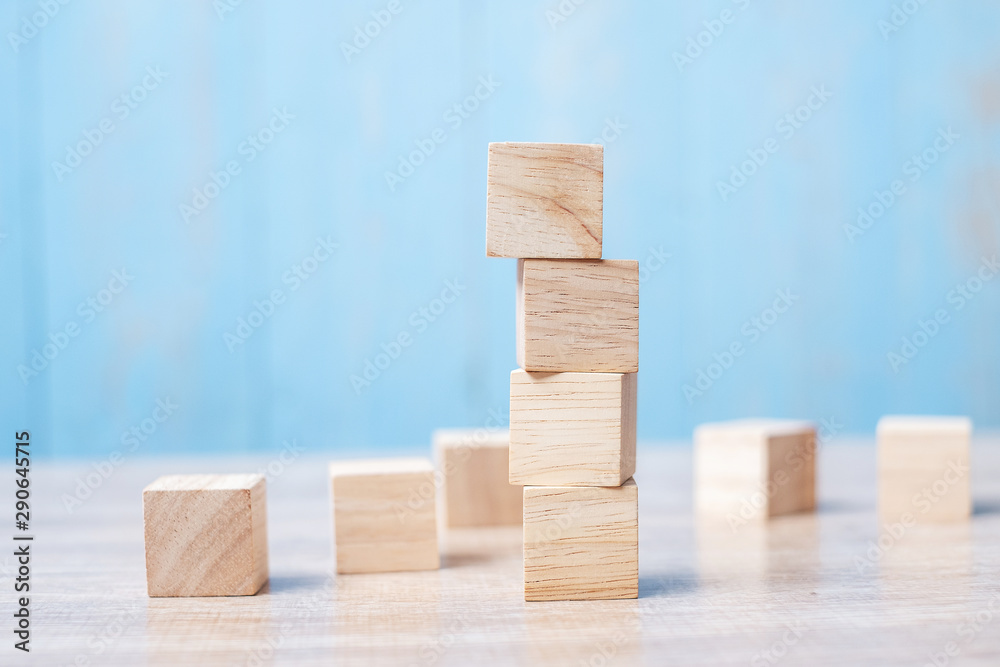 wooden block on the building. Business planning, Risk Management, Solution, strategy, different and Unique Concepts wooden block on the building. Business planning, Risk Management, Solution, strategy, different and Unique Concepts