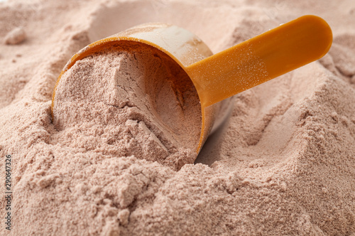 Foto Exercising , weight loss shake and muscle gain conceptual idea with close up on