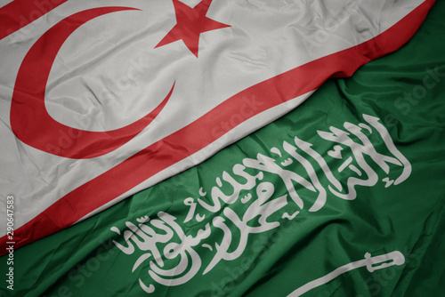 Tableau sur toile waving colorful flag of saudi arabia and national flag of northern cyprus