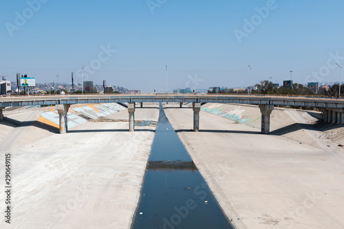  The Tijuana River canal, which often serves as the location of homeless encampments of individuals deported from the United States.