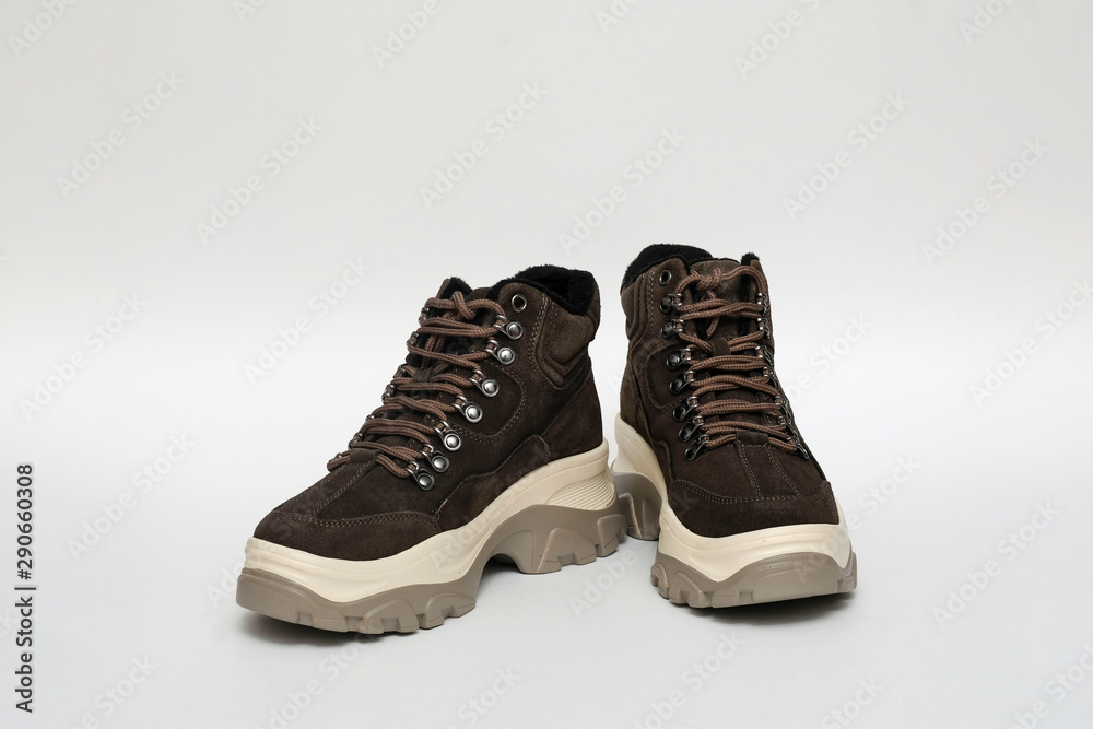 Unbranded modern sporty shoes, sneakers on white background isolated Unbranded modern sporty shoes, sneakers on white background isolated