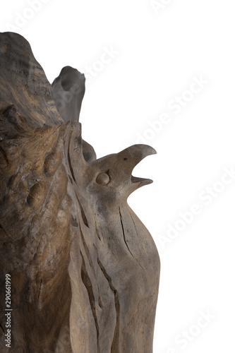 Carved sculpture of bog oak on a white background.
