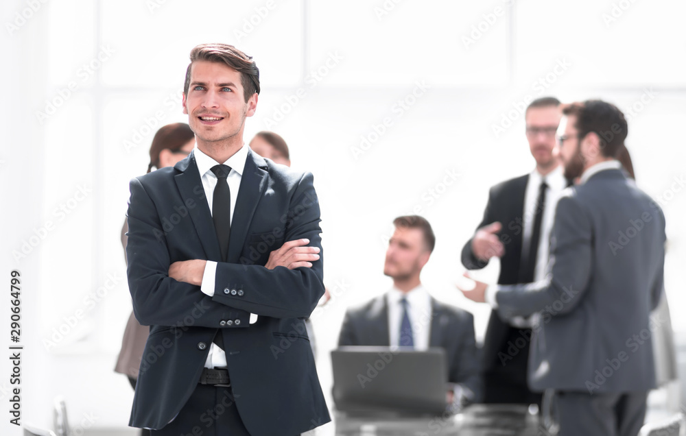 dreaming businessman on the background of the office.
