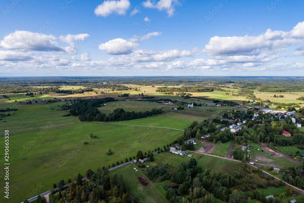 Obraz premium Overhead view of foliage trees, fields and roads in Western Europe. Aerial photography.