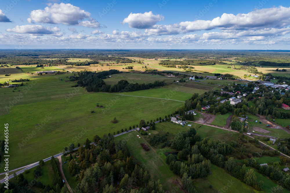 Overhead view of foliage trees, fields and roads in Western Europe. Aerial photography.