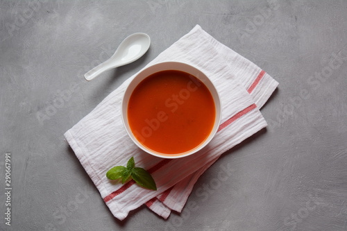 Hot tomato soup puree. Healthy winter, autumn soup concept