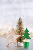 Christmas tree on silver, bokeh background.