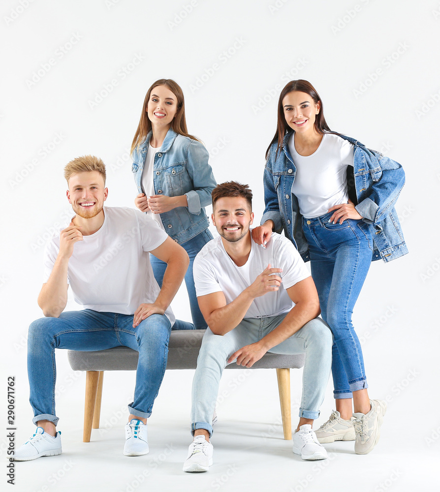 Obraz premium Group of young people in stylish casual clothes on white background