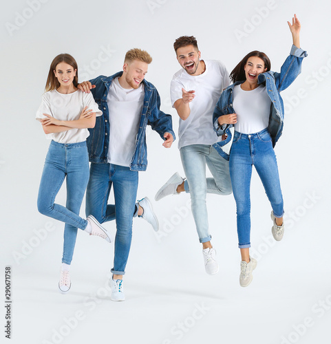 Group of jumping young peop...