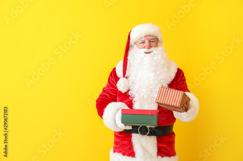 Santa Claus with gifts on c...