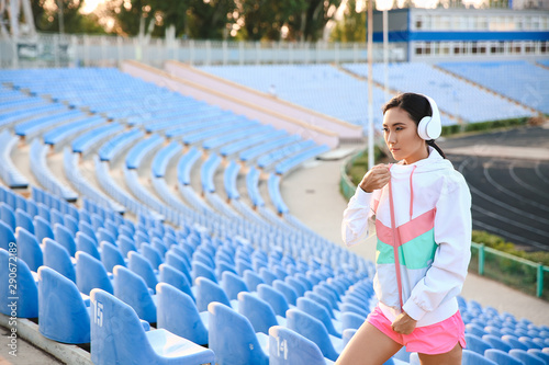 Sporty Asian woman at the s...