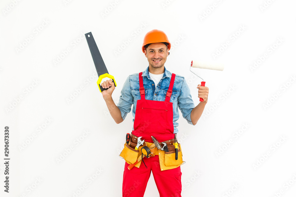 young friendly crouch manual worker isolated on white young friendly crouch manual worker isolated on white