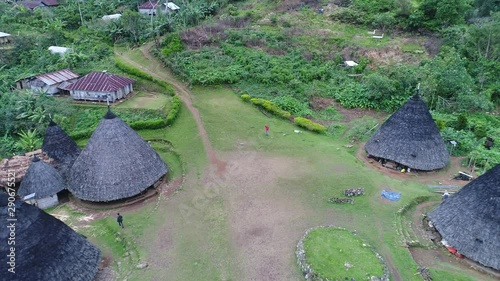 Traditional village Wae Rebo on Flores island in Indonesia. aerial view drone 4k.	 photo