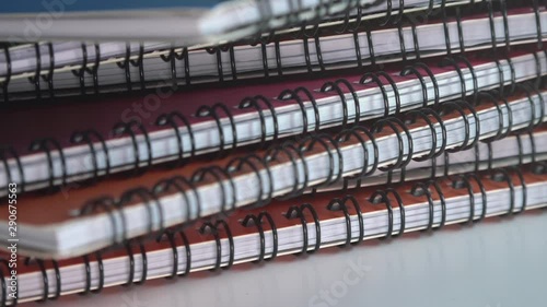 Close Shot of an Assortment of Ring Bound Books Rotating