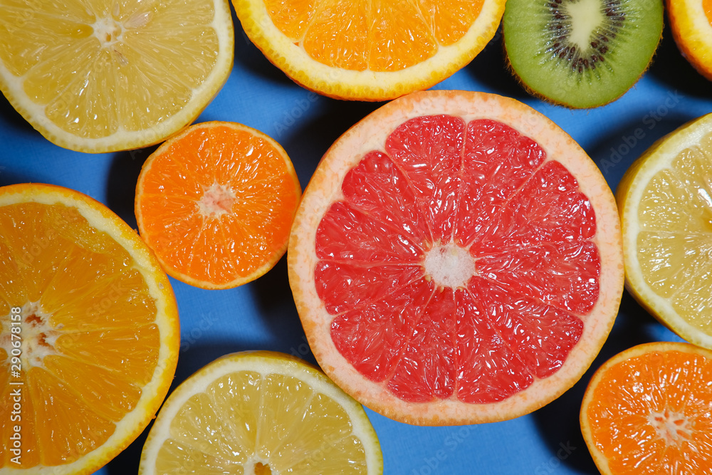 Fresh summer fruits on blue background. Healthy food concept. Flat lay. Fresh summer fruits on blue background. Healthy food concept. Flat lay.
