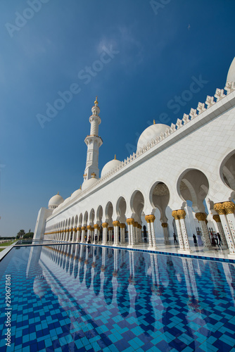 ABU DHABI, UAE - DECEMBER 2016: Exterior view of  Sheikh Zayed Mosque on a beautiful day. This is a major tourist attraction