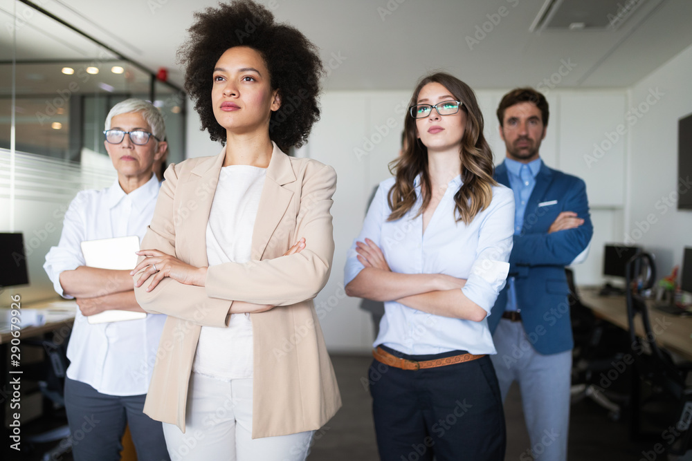 Group of successful business people at work in office Group of successful business people at work in office