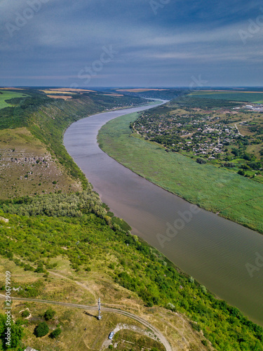 Arial view over the river and small village. Dniester river. photo