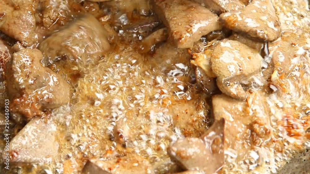 Frying pork liver in pan, Chiangmai Thailand Frying pork liver in pan, Chiangmai Thailand