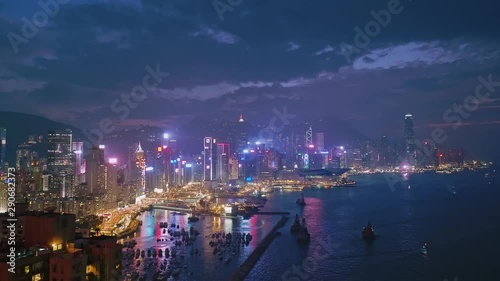 Wallpaper Mural Elevated view overlooking Victoria Harbour skyline at dusk, Hong Kong Island, HK. Slow zoom in Torontodigital.ca