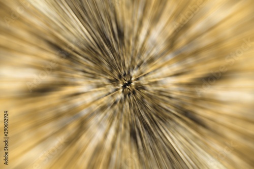 Abstract blurred golden background, zoom effect