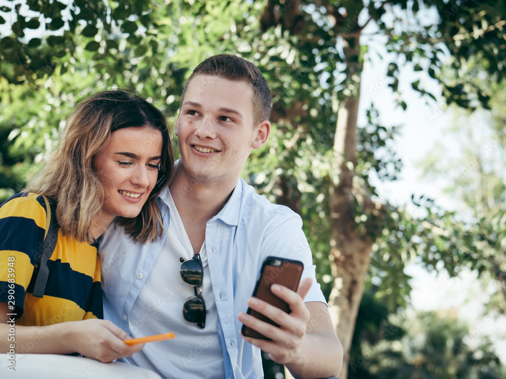 Happy couple selfie photo together by smartphone. Happy couple selfie photo together by smartphone.