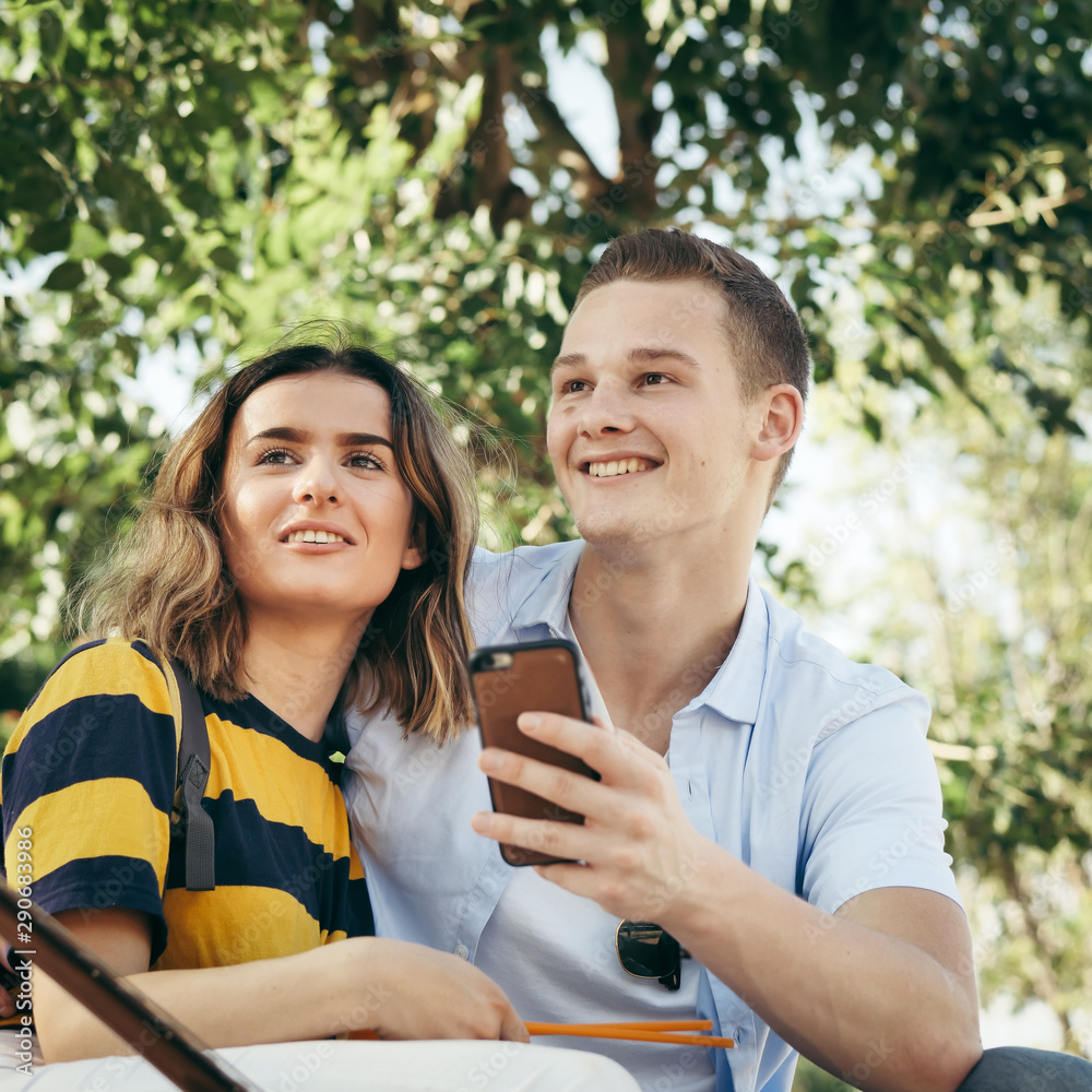 Happy couple selfie photo together by smartphone. Happy couple selfie photo together by smartphone.