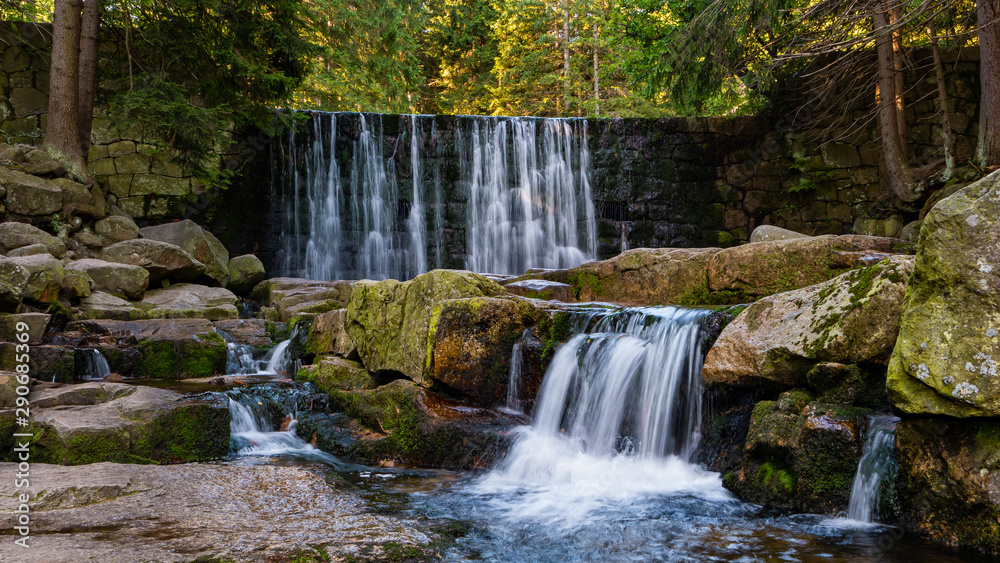 Fototapeta premium Wild Waterfall in beautiful scenery of Karkonosze Mountains in Karpacz, Poland 