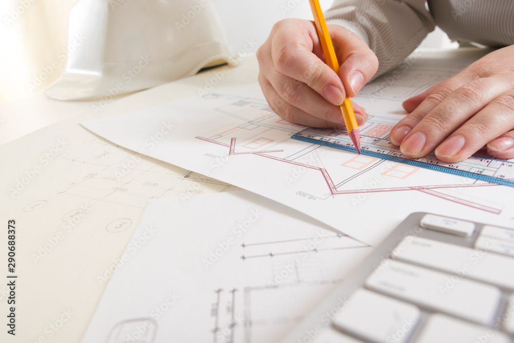 Architects working on blueprint. Architects workplace. Construction concept. Engineering tools. Architects working on blueprint. Architects workplace. Construction concept. Engineering tools.