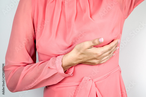 Breast health concept. Woman taking self examination using hands