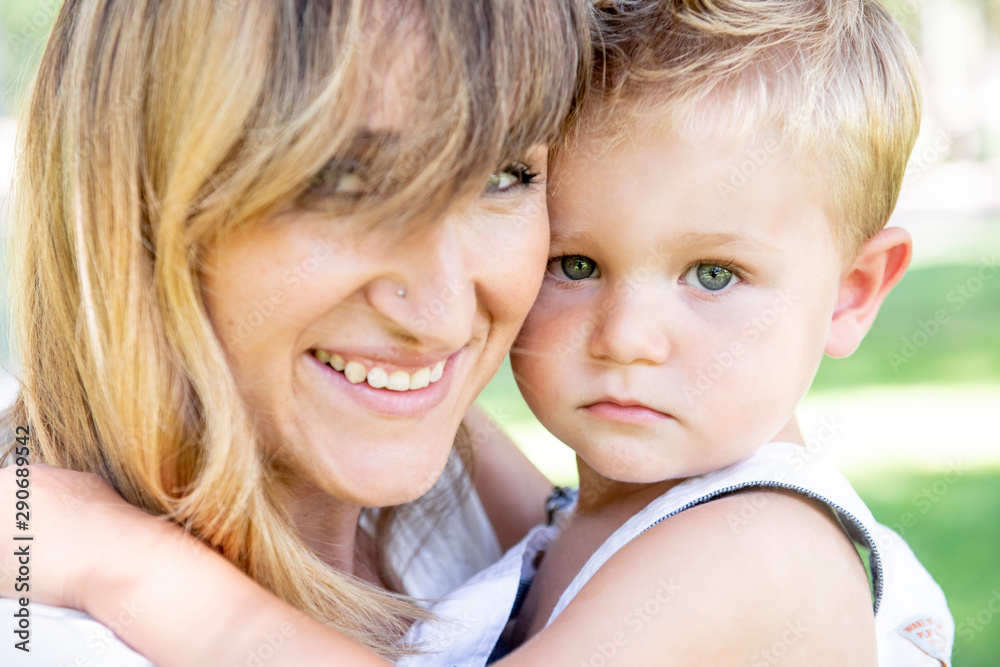 Pretty mother with her precious baby Pretty mother with her precious baby
