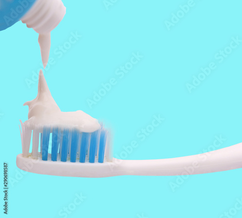 Close up Toothbrush isolated on blue background.