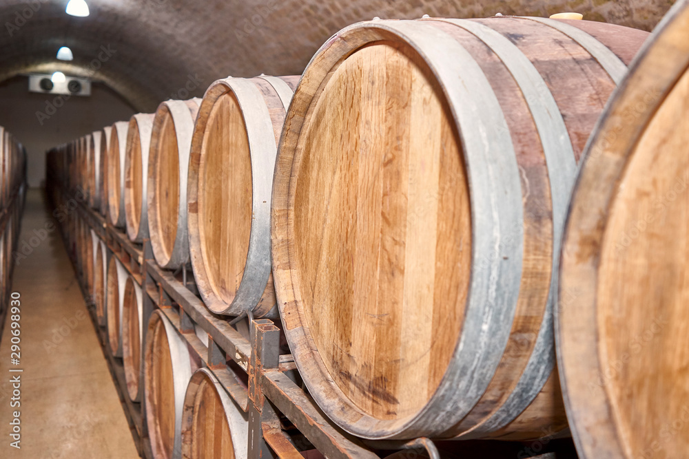 beautiful photo of a wooden barrel of wine.