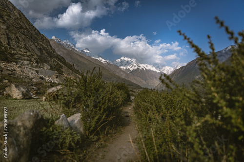 View of Chitkul village in Himachal pradesh. India's last village towards China . Amazing Landscape of Himalayas, Moody edit. Beautiful snow mountains. Kinnaur & Sangla mountain ranges © VIVEK