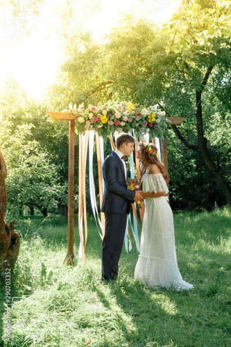 Bride and groom during wedd...