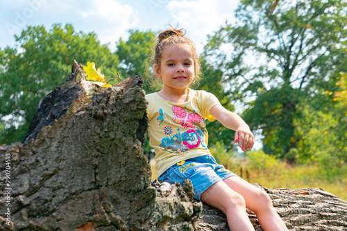 Little girl having fun on t...