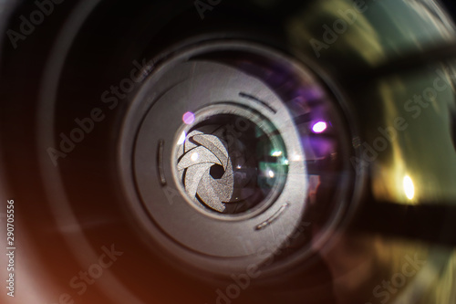 Close-up camera lens, aperture. The concept of photographic equipment, optics, the basics of photography, lens selection. Macro photo.