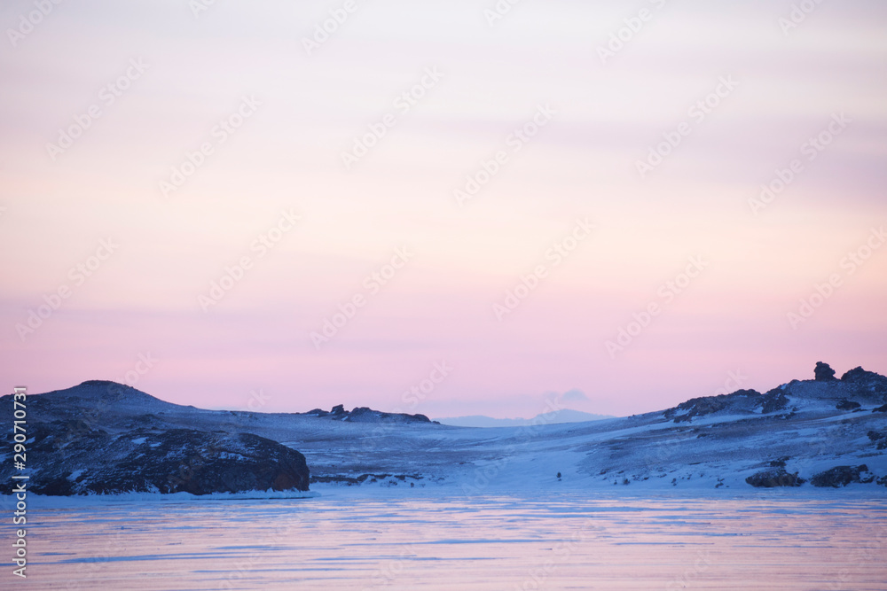Lake Baikal. Cape Uyuga winter sunset landscape