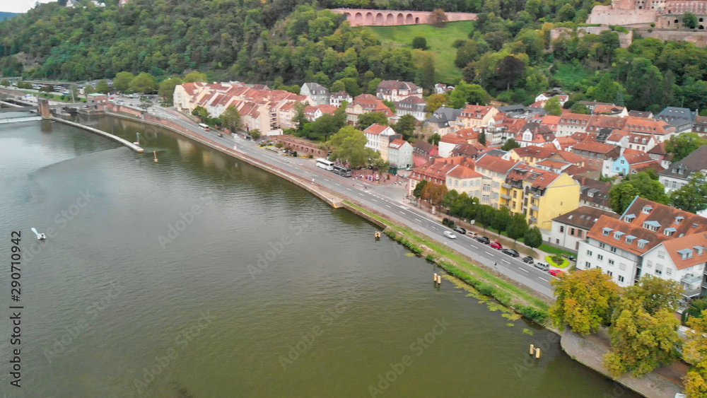 Heidelberg Aerial View, Germany. Drone flying along Chain Bridge and main city landmarks
