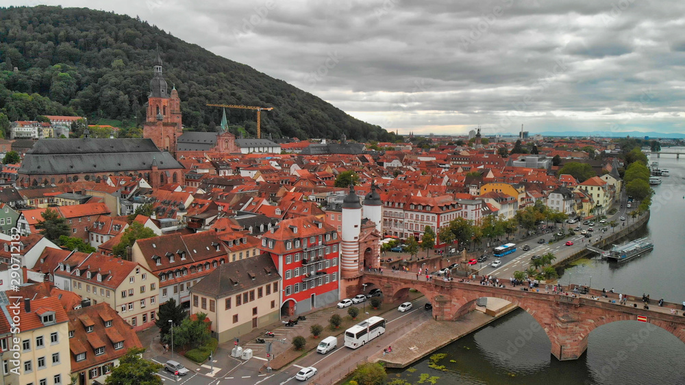 Heidelberg Aerial View, Germany. Drone flying along Chain Bridge and main city landmarks