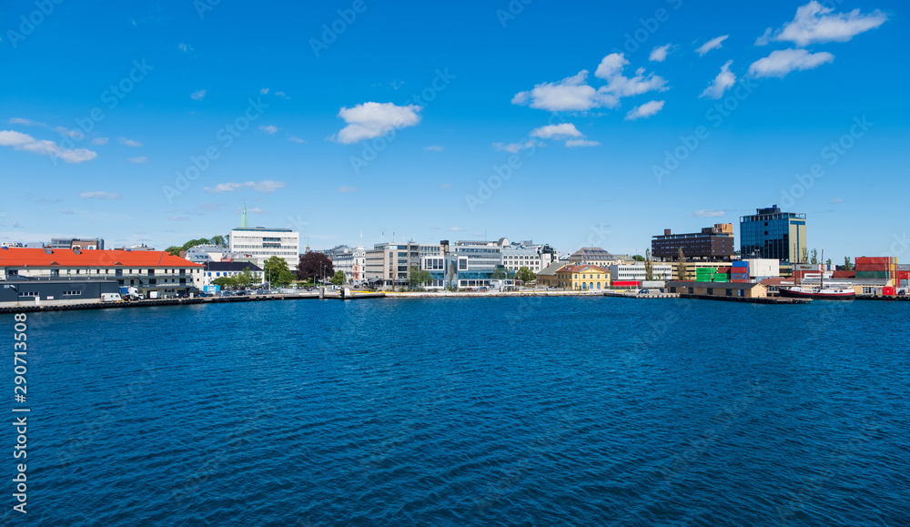 Beautiful seascape norwegian coastline, coast of Kristiansand with buildings, Scandinavia, Norway. July 2019